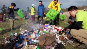 志愿者团队16年从山中捡出9万个废弃罐