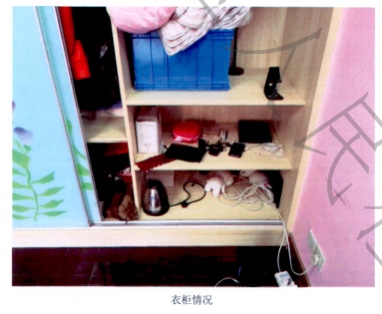 衣柜被翻动的痕迹  本文图片均为上海市普陀区人民检察院供图