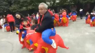 爷爷穿恐龙装参加幼儿园运动会，网友：一脸严肃做着可爱的事