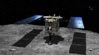 日本小行星探测器隼鸟2号回收舱返回地球 