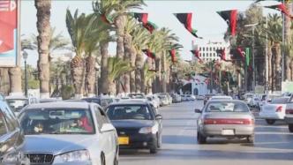 为进一步实现经济改革，利比亚央行调整第纳尔对美元汇率