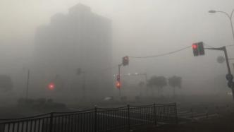 上海今晨升级大雾橙色预警，局部地区能见度小于50米