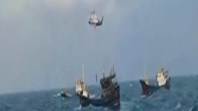 温州南麂岛海域一渔船起火9人遇险,直升机紧急救援