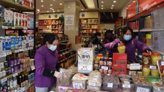 上海首家24小时商店“星火日夜”恢复营业，顾客盈门购年货