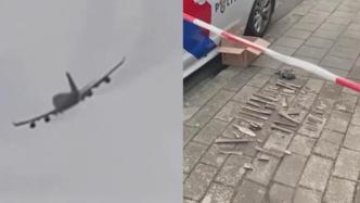 荷兰一架波音747货机起飞后引擎起火，碎片掉落致2人受伤