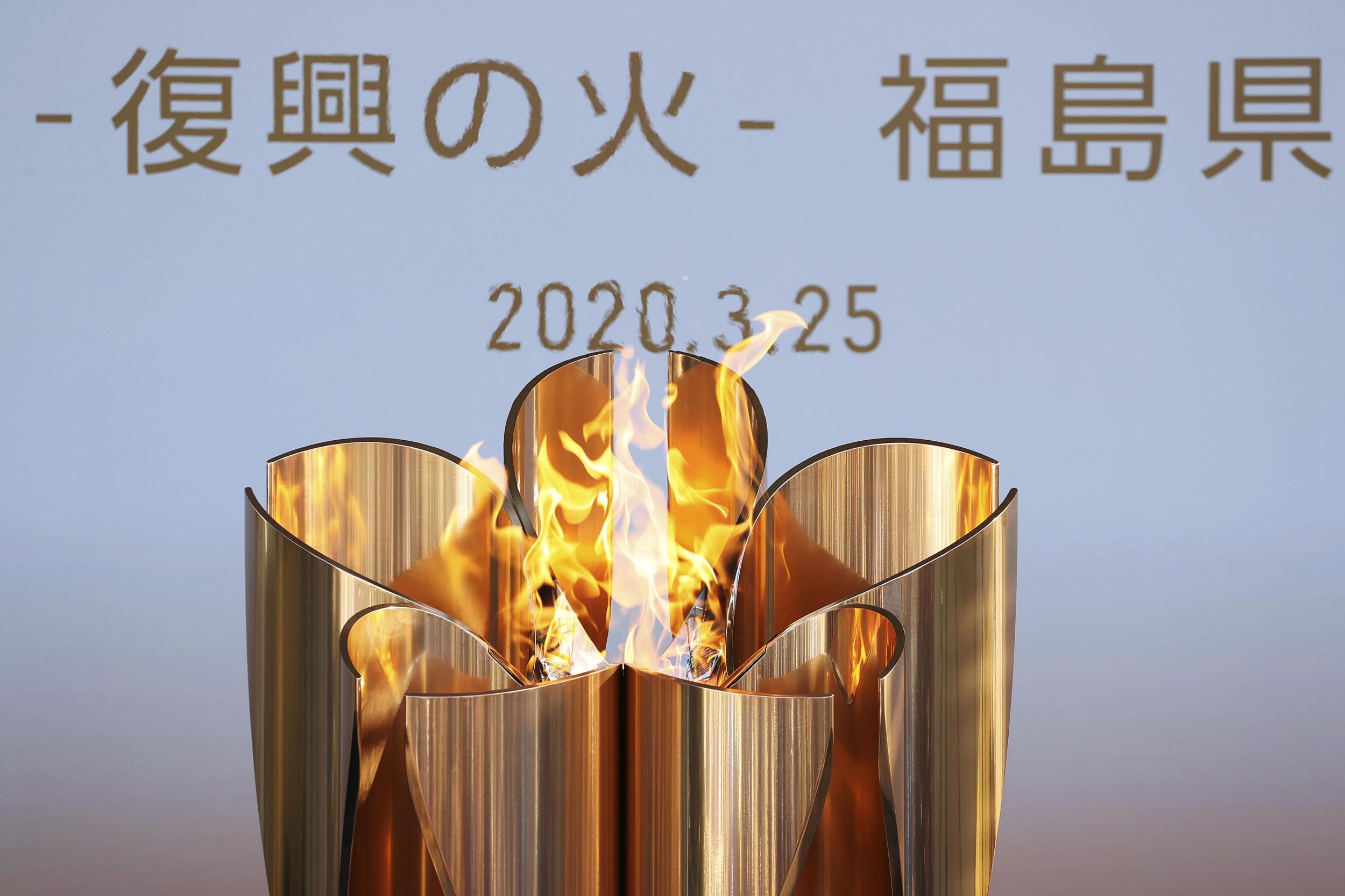 特写|曲折的奥运圣火传递,从未熄灭的星火希望_运动家_澎湃新闻-The Paper