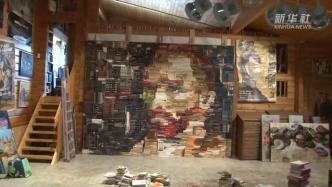 西班牙艺术家用书籍拼接创作3米高梵高肖像