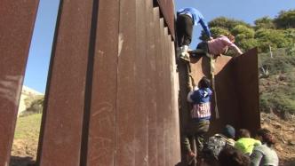 美媒：拜登政府或继续修建美墨边境墙以应对移民危机