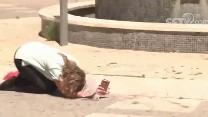 以色列民眾跪伏在大街上躲避襲擊：希望終有一日和平降臨