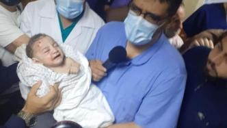加沙地带难民营遭空袭，一户家庭中仅2个月大婴儿幸存
