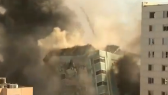 以色列确认轰炸加沙媒体大楼，哈马斯称将作出回应
