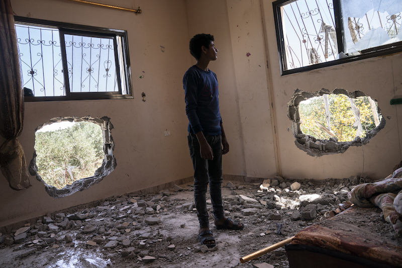 图集丨巴以冲突暂停加沙居民在废墟上继续生活