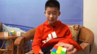 视频|浙江13岁男孩以平均5秒48打破魔方世界纪录
