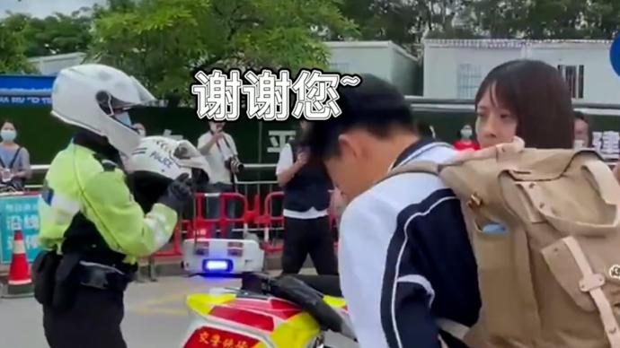 深圳考生乘车堵高架交警骑摩托载送，临别时鞠躬致谢