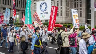 日本数百民众上街游行，要求取消东京奥运会
