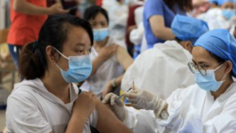 美国多家媒体关注中国新冠疫苗接种接近10亿剂次