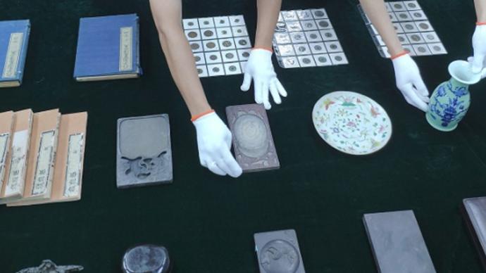 广州海关向文物部门移交83件走私文物，含古钱币、砚台等