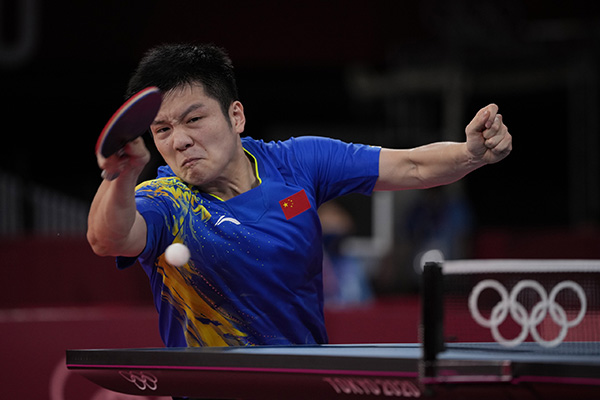 2020东京奥运会乒乓球男单第3轮：樊振东4-0莱贝松  视觉中国 图