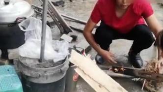 泸县村民空地搭建临时厨房，自带柴米油盐为救援队煮面