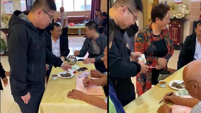 男子掏出10捆1元紙幣隨禮:給結(jié)婚的朋友做私房錢