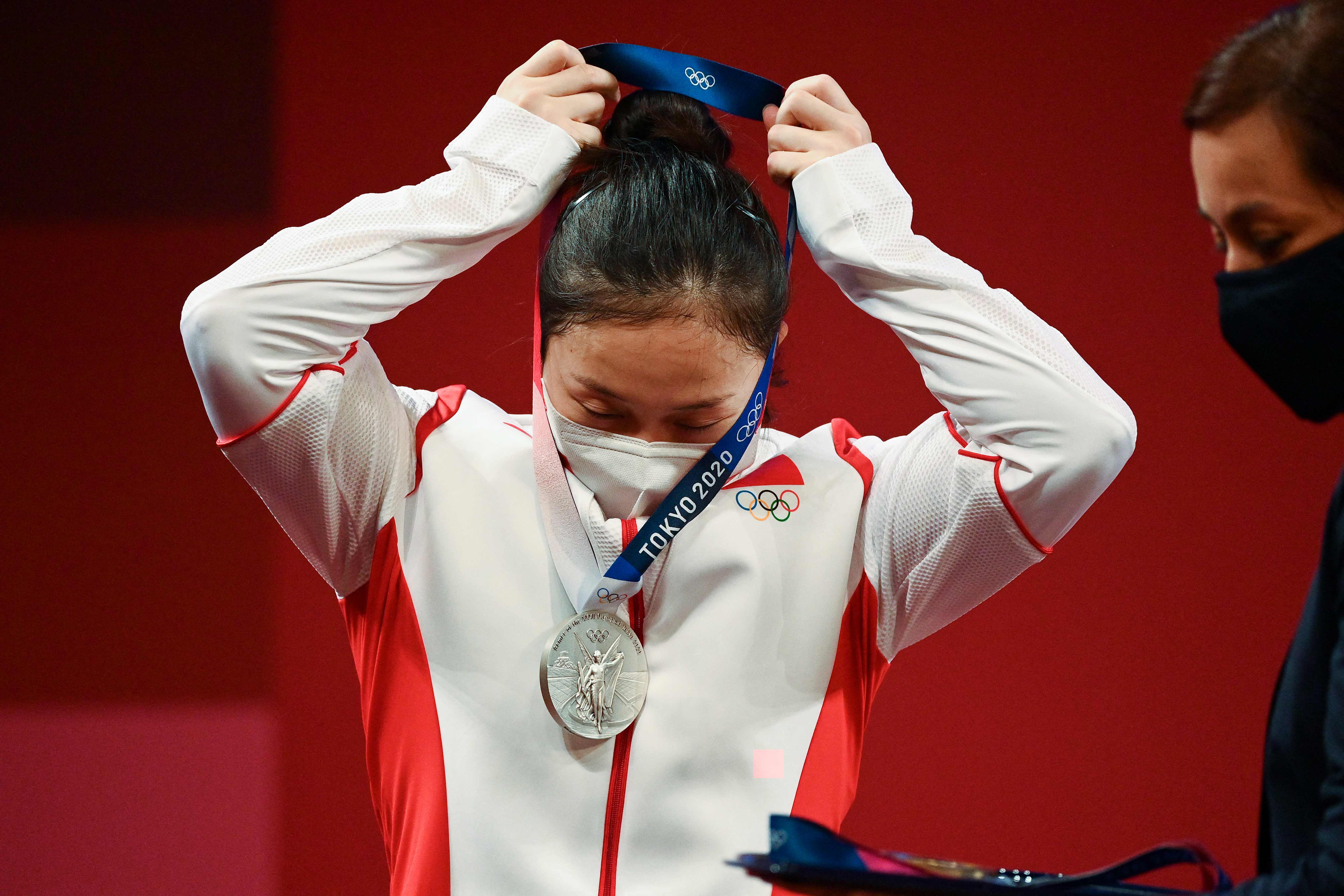 人生不差"一公斤",廖秋云拿到奥运举重银牌之后