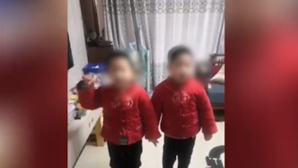 江苏苏州：双胞胎儿子为抗疫医生父母加油