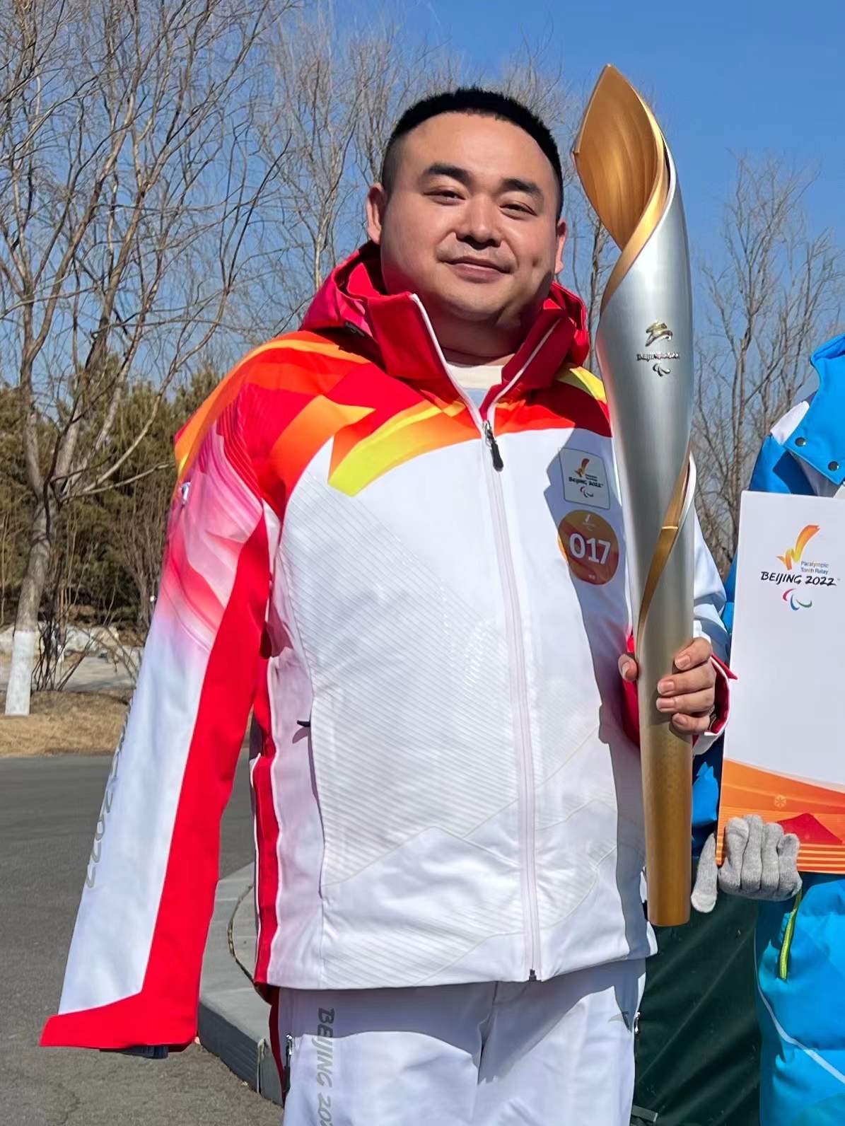 来自可口可乐中国系统的延庆世园公园第17棒火炬手薛枭