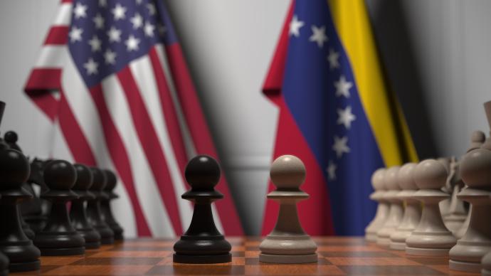 俄乌冲突当前，美国向老对头委内瑞拉伸出橄榄枝意欲何为？