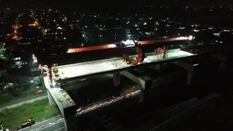 印尼雅万高铁全线最长跨高速公路箱梁架设完成