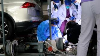 武汉一男子被立体车库绞伤左腿，医生及时户外手术截肢保命