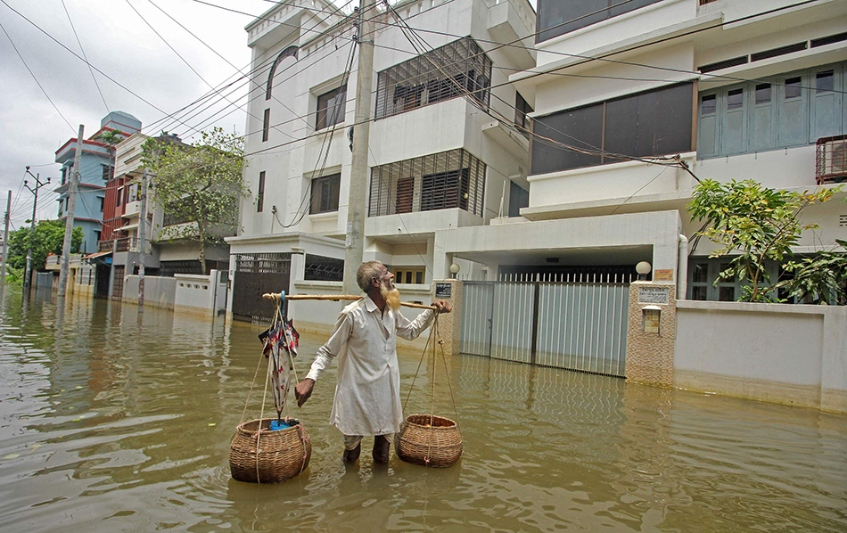 當地時間2022年5月21日,孟加拉國錫爾赫特,大雨引發洪水,社區被淹沒.