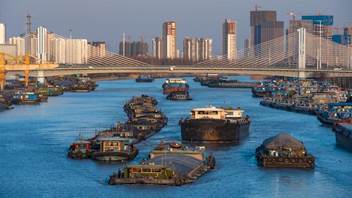 业余摄影师16年拍下十万张淮安大运河照片：记录了城市发展