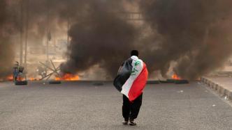 萨德尔支持者开始从巴格达街头撤离，伊拉克解除全国宵禁