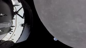 猎户座飞船成功飞越月球，传回月球与地球同框画面