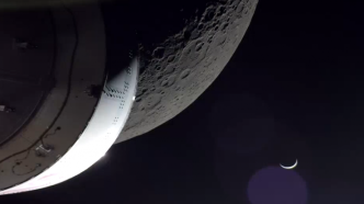 “猎户座”飞船返程前传回罕见画面：月牙形地球从月亮升起