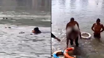 武汉女子捡手机坠江靠羽绒服漂浮，救援队员冬泳时发现救起