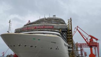 外高桥造船：首艘国产大型邮轮计划5月底出坞，争取年底交付