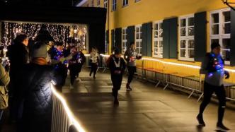 丹麦首都哥本哈根举行“灯光跑”活动