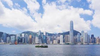 李家超：香港将全面加强“两个中心”建设
