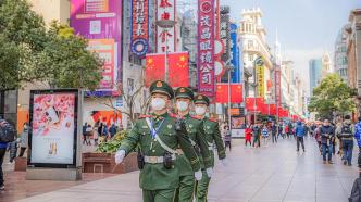 在上海，他们谱写新时代“霓虹灯下的哨兵”新荣光