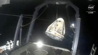 美国“龙”飞船载美日俄4名宇航员返回地球
