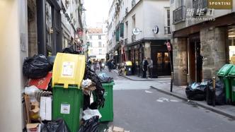 法国环卫工人罢工，巴黎街头垃圾成山
