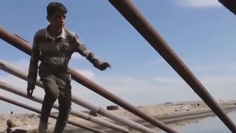 战乱中艰难求生，叙利亚男孩扛起生活重担