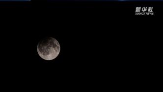 半影月食来了！天文爱好者记录下“月亮变脸”