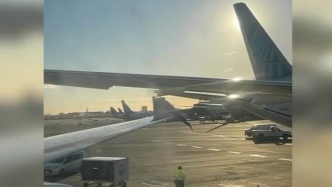 美国两客机在机场相撞：其中一架坐满乘客，所幸无人受伤