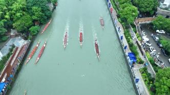 中国龙舟公开赛在上海苏州河激情开赛，奏响“水上交响乐”