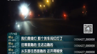 上海一司机开临牌重型吊车15分钟连闯9个红灯，被扣54分
