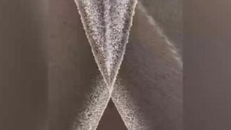 钱塘江同时出现“鱼鳞潮”和“交叉潮”