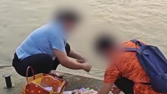 视频丨两人江边放生鱼豆腐，东莞水务局：巡查人员看到会劝阻