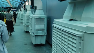 装空调了！上海地铁宜山路换乘通道18台冷风机和电扇一起开启